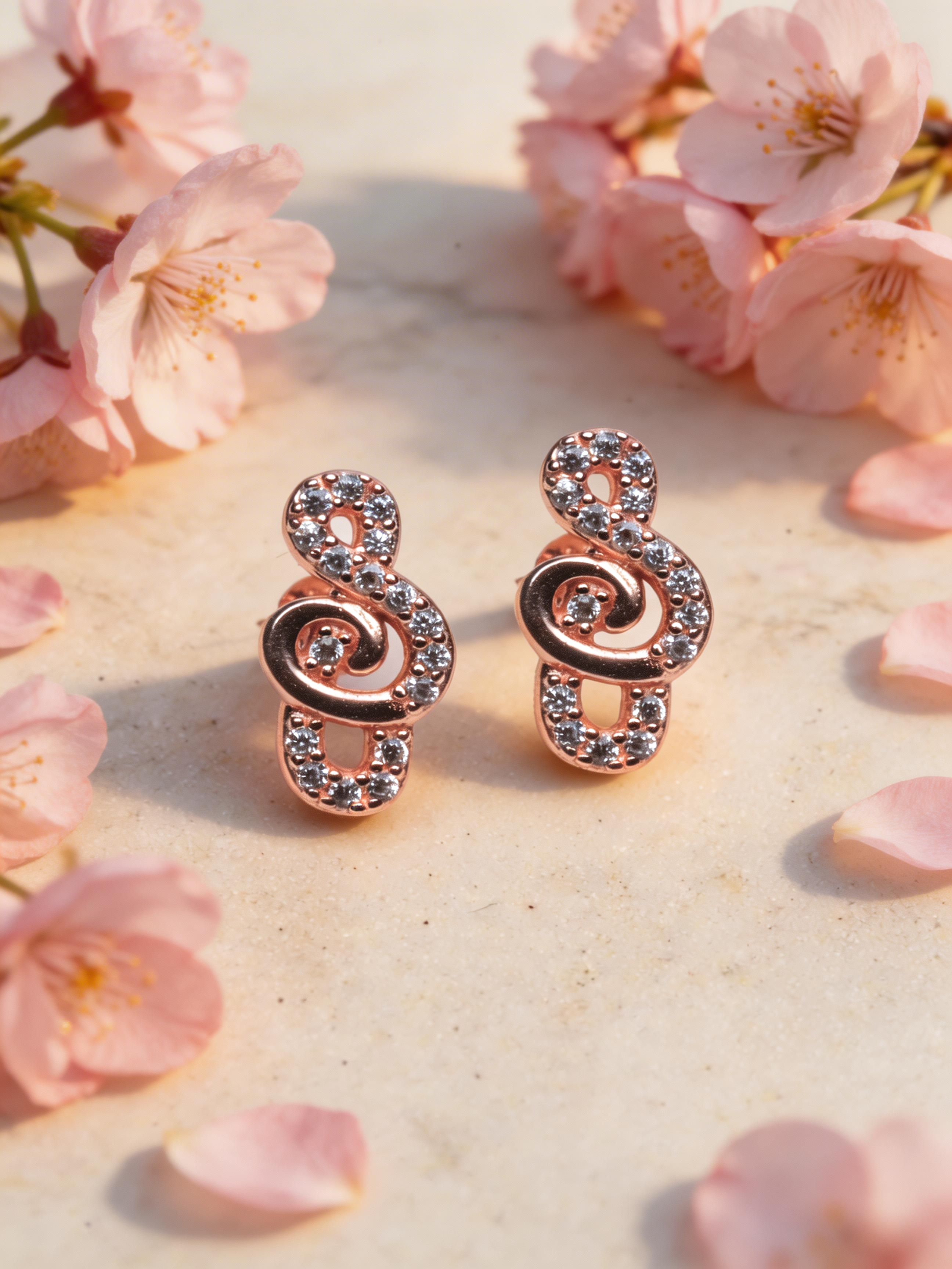 Nilo Rose Gold Crystal Treble Swirl Stud Earrings