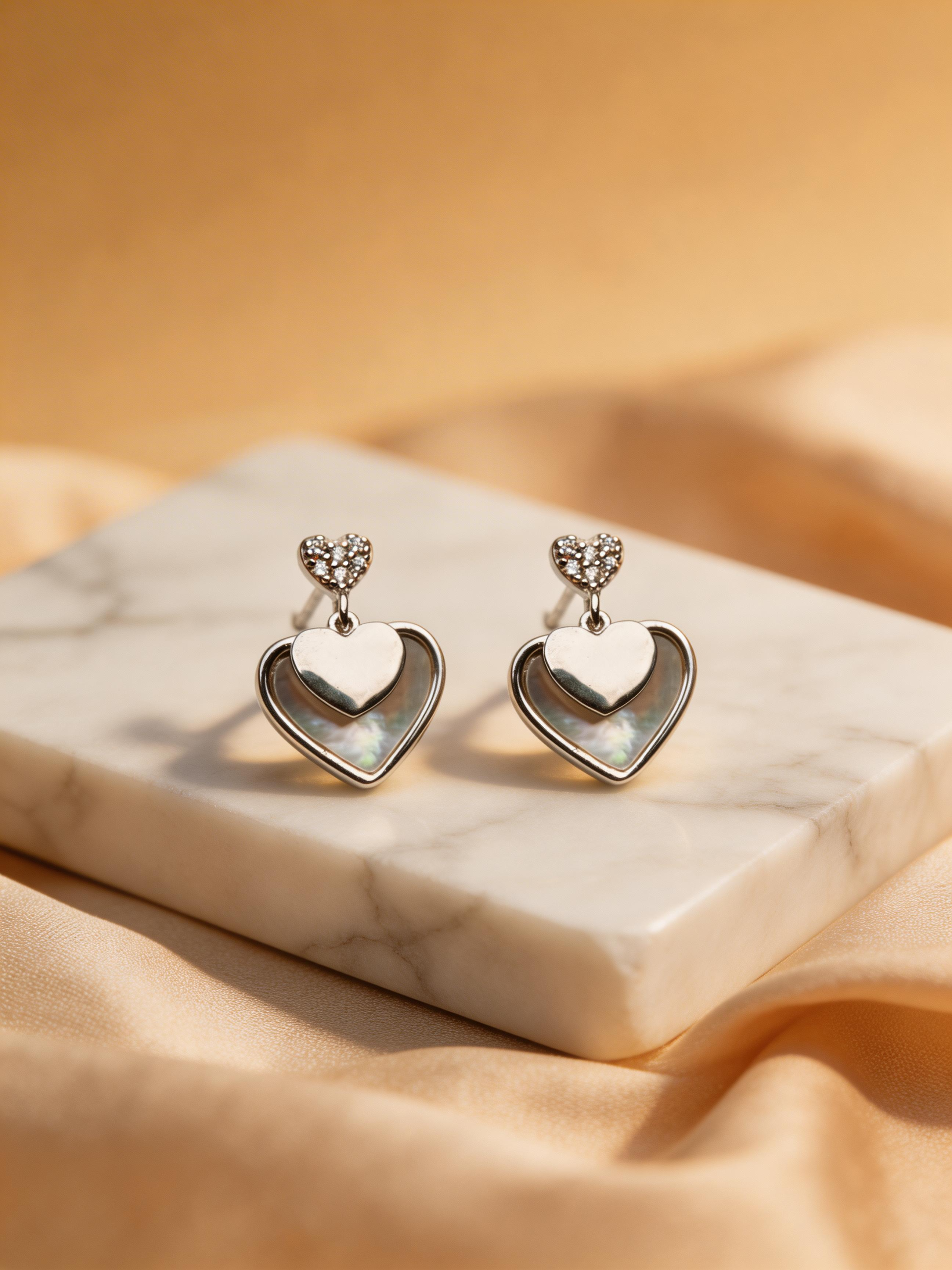 Nilo Twin Heart Drop Stud Earrings